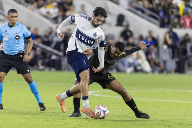 October 10, 2026, Los Angeles, California, USA: Vancouver Whitecaps striker Brian White (24) and Los Angeles FC defensive midfielder Igor Jesus (6) vie for the ball during a MLS, Fussball Herren, USA soccer game on Saturday, Oct. 10, 2026 in Los Angeles. Los Angeles USA - ZUMAc68_ 20261010_zaf_c68_060 Copyright: xRingoxChiux