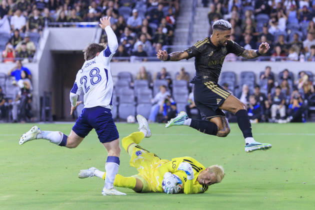 October 10, 2026, Los Angeles, California, USA: Goalkeeper, Yohei Takaoka 1 of the Vancouver Whitecaps saves a shot attempt from Denis Bouanga 99 of the Los Angeles Football Club during their regular season MLS, Fussball Herren, USA game on Saturday October 10, 2026 at the BMO Stadium in Los Angeles, California. LAFC tie with Whitecaps, 1-1. ARIANA RUIZ PI Los Angeles USA - ZUMAp124 20261010_zaa_p124_013 Copyright: xArianaxRuizx