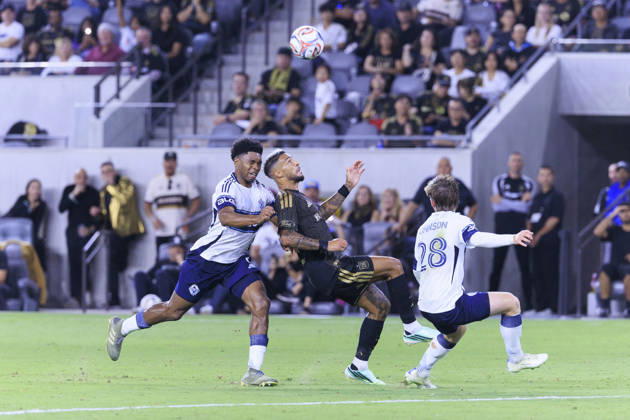 October 10, 2026, Los Angeles, California, USA: Ralph Priso-Mbongue 6 of the Vancouver Whitecaps collides with Denis Bouanga 99 of the Los Angeles Football Club as he receives the ball during their regular season MLS, Fussball Herren, USA game on Saturday October 10, 2026 at the BMO Stadium in Los Angeles, California. LAFC tie with Whitecaps, 1-1. ARIANA RUIZ PI Los Angeles USA - ZUMAp124 20261010_zaa_p124_016 Copyright: xArianaxRuizx