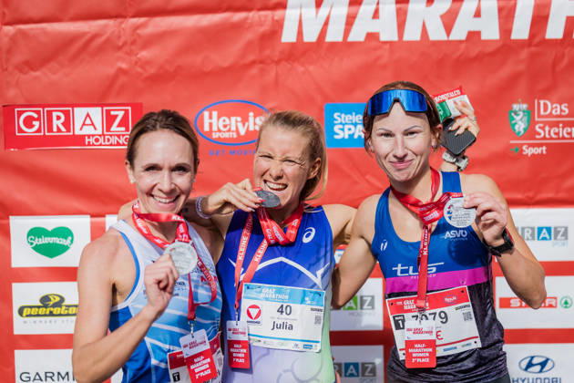 RUNNING - Graz Marathon 2026 GRAZ,AUSTRIA,11.OCT.26 - RUNNING - Graz Marathon. Image shows Susanne Christopharo (AUT), Julia Mayer (AUT) and Ute Pirchan (AUT). Keywords: medal.  GEPAxpictures xMatthiasxTrinkl