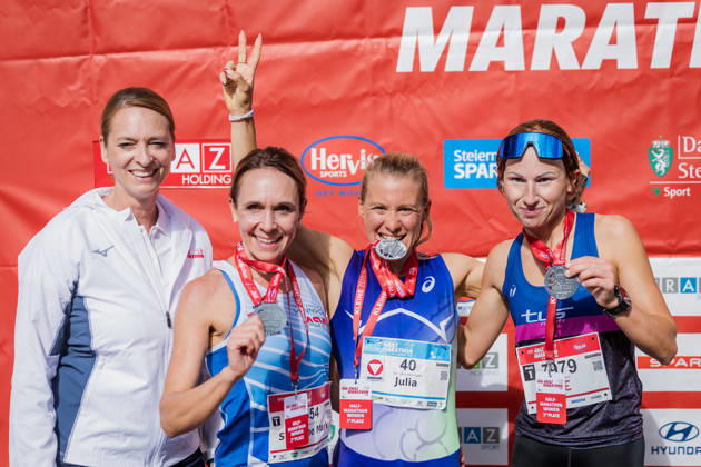 RUNNING - Graz Marathon 2026 GRAZ,AUSTRIA,11.OCT.26 - RUNNING - Graz Marathon. Image shows Xenia Daum (Kleine Zeitung), Susanne Christopharo (AUT), Julia Mayer (AUT) and Ute Pirchan (AUT). Keywords: medal.  GEPAxpictures xMatthiasxTrinkl