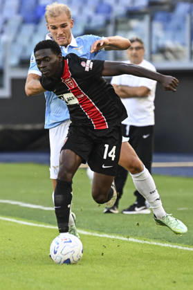 October 11, 2026, Rome, Italy: Monza™s Ebenezer Akinsanmiro (R) in action against Lazio™s Oliver Provstgaard (L) during the Serie A soccer match between SS Lazio and AC Monza at the Olimpico stadium in Rome, Italy, 11 October 2026. ANSA RICCARDO ANTIMIANI. Serie A: Lazio Vs Monza  - ZUMAa110 20261011_zaf_a110_016 Copyright: xRiccardoxAntimianix