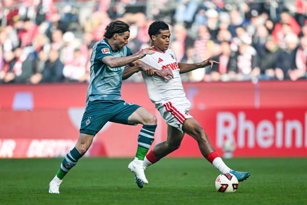 v. li. im Zweikampf Joe Scally (Moenchengladbach 29) Jahmai Simpson-Pusey (Koeln 22) 11.10.2026 ¢ Fussball ¢ 1. FC Koeln vs Borussia Moenchengladbach, RheinEnergieStadion, Koeln, DFB DFL REGULATIONS PROHIBIT ANY USE OF PHOTOGRAPHS AS IMAGE SEQUENCES AND OR QUASI-VIDEO NRW Germany