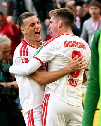 Cologne, Germany, 1. Bundesliga, Matchday 5, Rhein-Energie-Stadium Cologne, 1. FC Köln vs Bor. Mönchengladbach; Isak Johannesson (FC) celebrates after scoring, together with Said El Mala (FC). Celebration, Joy, Action.