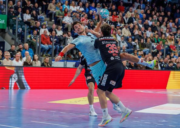 11.10.2026 - Handball - 1. Bundesliga OPEL HBL - Saison 2026 2027 - 08. Spieltag: HC Erlangen Metropolregion Nürnberg HCE - MT Melsungen - DaMa - xdaxmax - Nikolaj Enderleit (4, MT Melsungen ) Tobias Buck (39, HC Erlangen HCE )