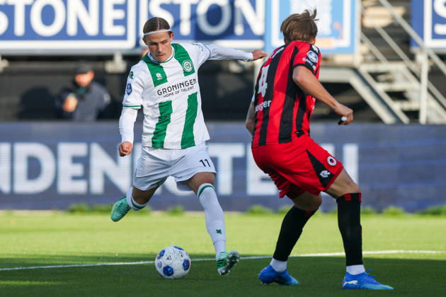 2026-10-11 Excelsior Rotterdam v FC Groningen - Dutch Eredivisie ROTTERDAM, NETHERLANDS - OCTOBER 11: Jacob Ondrejka of FC Groningen is challenged by Casper Widell of Excelsior Rotterdam during the Dutch Eredivisie match between Excelsior Rotterdam and FC Groningen at Stadion Woudestein on October 11, 2026 in Rotterdam, Netherlands. Rotterdam Stadion Woudestein Netherlands Content not available for redistribution in The Netherlands directly or indirectly through any third parties. Copyright: xHansxvanxderxValkx