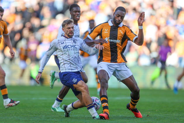 RECORD DATE NOT STATED 11th October 2026; MKM Stadium, Hull, England; Premier League Football, Hull City versus Everton; Semi Ajayi of Hull City tackles Kiernan Dewsbury-Hall of Everton DavexLofthouse