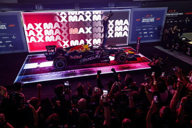 F1 - SINGAPORE GRAND PRIX 2026 VERSTAPPEN Max (nld), Red Bull Racing Ford RB22, portrait celebrating this win during the 2026 Formula 1 Singapore Grand Prix, 17th round of the 2026 Formula One World Championship, WM, Weltmeisterschaft from October 9 to 11, 2026 on the Marina Bay Street Circuit, in Singapore, Singapore - SingaporeSingapore  Copyright: xJulienxDelfossex