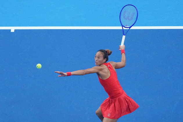 (261011) -- BEIJING, Oct. 11, 2026 -- Zheng Qinwen hits a return during the women s singles final between Zheng Qinwen of China and Mirra Andreeva of Russia at 2026 China Open tennis tournament in Beijing, China, Oct. 11, 2026. ) (SP)CHINA-BEIJING-TENNIS-CHINA OPEN-WOMEN S SINGLES-FINAL (CN) JuxHuanzong