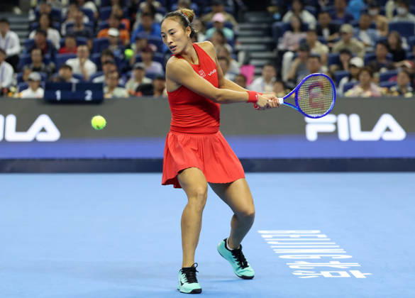 (261011) -- BEIJING, Oct. 11, 2026 -- Zheng Qinwen hits a return during the women s singles final between Zheng Qinwen of China and Mirra Andreeva of Russia at 2026 China Open tennis tournament in Beijing, China, Oct. 11, 2026. ) (SP)CHINA-BEIJING-TENNIS-CHINA OPEN-WOMEN S SINGLES-FINAL (CN) ZhangxChenlin