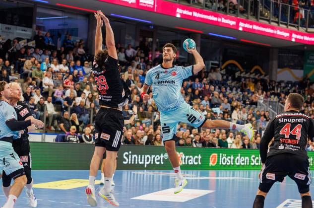 11.10.2026 - Handball - 1. Bundesliga OPEL HBL - Saison 2026 2027 - 08. Spieltag: HC Erlangen Metropolregion Nürnberg HCE - MT Melsungen - DaMa - xdaxmax - Tobias Buck (39, HC Erlangen HCE ) Nikolaj Enderleit (4, MT Melsungen )