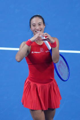 (261011) -- BEIJING, Oct. 11, 2026 -- Zheng Qinwen reacts after the women s singles final between Zheng Qinwen of China and Mirra Andreeva of Russia at 2026 China Open tennis tournament in Beijing, China, Oct. 11, 2026. ) (SP)CHINA-BEIJING-TENNIS-CHINA OPEN-WOMEN S SINGLES-FINAL (CN) JuxHuanzong