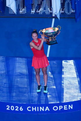 (261011) -- BEIJING, Oct. 11, 2026 -- Zheng Qinwen poses with the trophy during the awarding ceremony after the women s singles final between Zheng Qinwen of China and Mirra Andreeva of Russia at 2026 China Open tennis tournament in Beijing, China, Oct. 11, 2026. ) (SP)CHINA-BEIJING-TENNIS-CHINA OPEN-WOMEN S SINGLES-FINAL (CN) JuxHuanzong