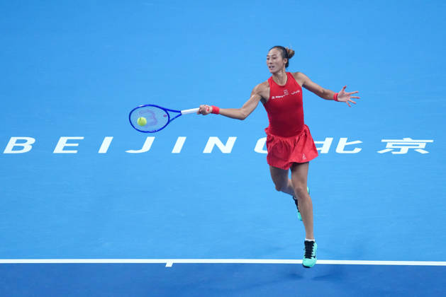 (261011) -- BEIJING, Oct. 11, 2026 -- Zheng Qinwen hits a return during the women s singles final between Zheng Qinwen of China and Mirra Andreeva of Russia at 2026 China Open tennis tournament in Beijing, China, Oct. 11, 2026. ) (SP)CHINA-BEIJING-TENNIS-CHINA OPEN-WOMEN S SINGLES-FINAL (CN) JuxHuanzong 