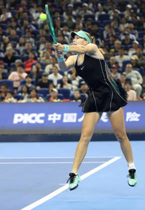 (261011) -- BEIJING, Oct. 11, 2026 -- Mirra Andreeva hits a return during the women s singles final between Zheng Qinwen of China and Mirra Andreeva of Russia at 2026 China Open tennis tournament in Beijing, China, Oct. 11, 2026. ) (SP)CHINA-BEIJING-TENNIS-CHINA OPEN-WOMEN S SINGLES-FINAL (CN) ZhangxChenlin