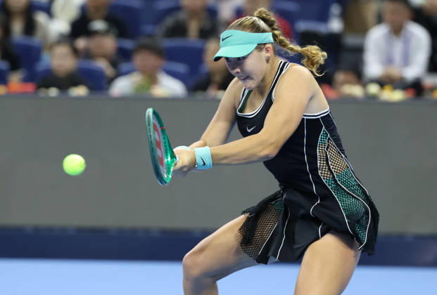 (261011) -- BEIJING, Oct. 11, 2026 -- Mirra Andreeva hits a return during the women s singles final between Zheng Qinwen of China and Mirra Andreeva of Russia at 2026 China Open tennis tournament in Beijing, China, Oct. 11, 2026. ) (SP)CHINA-BEIJING-TENNIS-CHINA OPEN-WOMEN S SINGLES-FINAL (CN) ZhangxChenlin