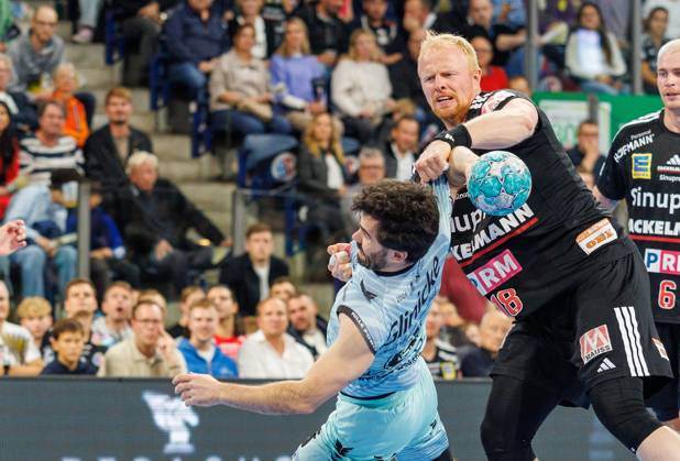11.10.2026 - Handball - 1. Bundesliga OPEL HBL - Saison 2026 2027 - 08. Spieltag: HC Erlangen Metropolregion Nürnberg HCE - MT Melsungen - DaMa - xdaxmax - Erik Balenciaga Azcue (6, MT Melsungen ) Sebastian Firnhaber (18, HC Erlangen HCE )