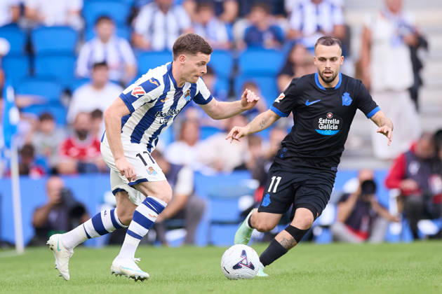 October 11, 2026, San Sebastian, Guipuzcoa, Spain: Sergio Gomez of Real Sociedad competes for the ball with David Mella of RC Deportivo de A Coruna during the LaLiga EA Sports match between Real Sociedad and RC Deportivo de A Coruna at Anoeta on October 11, 2026, in San Sebastian, Spain. San Sebastian Spain - ZUMAa181 20261011_zaa_a181_124 Copyright: xRicardoxLarreinax