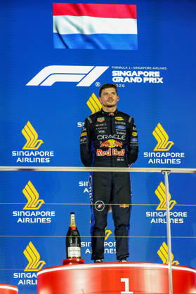 2026 Formula 1 Singapore Grand Prix SINGAPORE - OCT 11: Red Bull Racing driver Max Verstappen (C) celebrates with Ferrari s Charles Leclerc (L) and Mercedes’s Kimi Antonelli (R) on the podium, after winning the Formula 1 Singapore Grand Prix at the Marina Bay Street Circuit in Singapore on October 11, 2026. Daniel Ceng Anadolu Singapore Singapore. Editorial use only. Please get in touch for any other usage.  Copyright: x2026xAnadoluxDanielxCengx