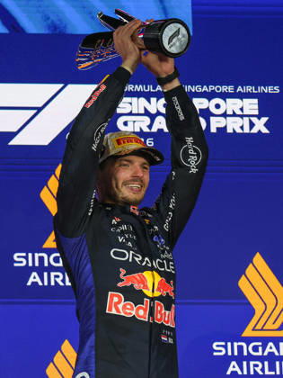 Max Verstappen wins 2026 Formula 1 Singapore Grand Prix SINGAPORE - OCT 11: Red Bull Racing driver Max Verstappen celebrates on the podium after winning the Formula 1 Singapore Grand Prix at the Marina Bay Street Circuit in Singapore on October 11, 2026. Daniel Ceng Anadolu Singapore Singapore. Editorial use only. Please get in touch for any other usage.  Copyright: x2026xAnadoluxDanielxCengx