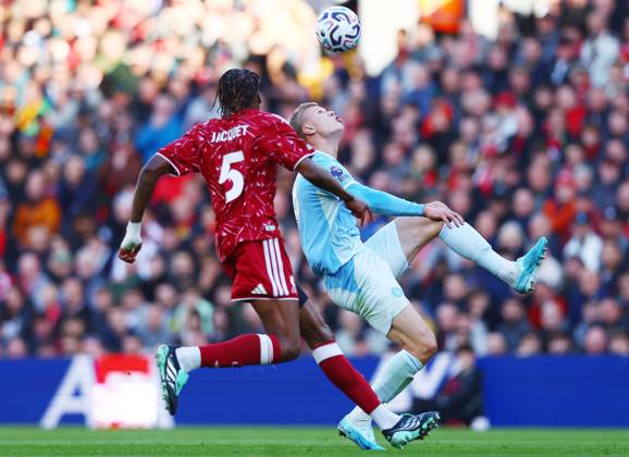 Erling Haaland of Manchester City and Jeremy Jacquet of Liverpool Liverpool v Manchester City, Premier League, Football, Anfield, Liverpool, UK - 11 Oct 2026Liverpool Anfield United Kingdom EDITORIAL USE ONLY No use with unauthorised audio, video, data, fixture lists, club league logos or live services. Online in-match use limited to 120 images, no video emulation. No use in betting, games or single club league player publications. Copyright: xMattxWest Shutterstockx 17210728n