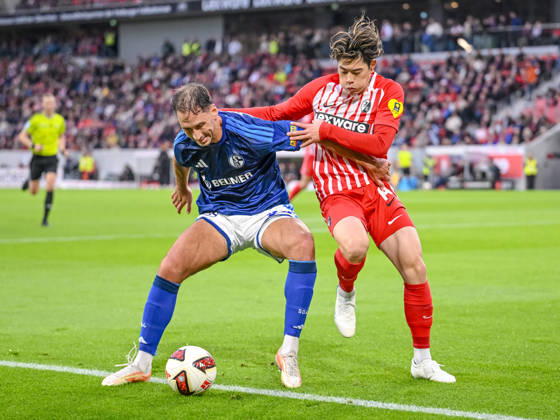 Nikola Katić (FC Schalke 04) und Yuito Suzuki (SC Freiburg) im Zweikampf waehrend des spiels der 1. Bundesliga zwischen Club Freiburg und FC Schalke 04, Europa-Park Stadion am 11. October 2026 in Freiburg im Breisgau, Deutschland. (Foto von Harry Langer DeFodi Images) +++ Nikola Katić (FC Schalke 04) und Yuito Suzuki (SC Freiburg) battle for the ball during the Bundesliga match between Sport-Club Freiburg and FC Schalke 04 at Europa-Park Stadion on October 11, 2026 in Freiburg im Breisgau, Germany. (Photo by Harry Langer DeFodi Images) DFB DFL REGULATIONS PROHIBIT ANY USE OF PHOTOGRAPHS AS IMAGE SEQUENCES AND OR QUASI-VIDEO. (Photo by Harry Langer DeFodi Images) DFB DFL REGULATIONS PROHIBIT ANY USE OF PHOTOGRAPHS AS IMAGE SEQUENCES AND OR QUASI-VIDEO. -