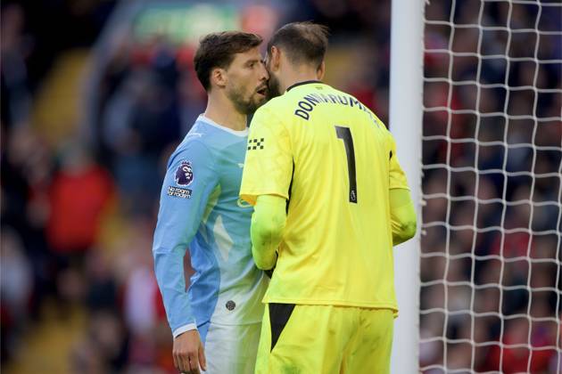 RECORD DATE NOT STATED Football - FA Premier League - Liverpool FC v Manchester City FC LIVERPOOL, ENGLAND - Sunday, October 11, 2026: Manchester City s captain Ruben Dias and goalkeeper Gianluigi Donnarumma (R) during the FA Premier League match between Liverpool FC and Manchester City FC at Anfield. (Photo by David Rawcliffe Propaganda) LIVERPOOL Anfield MERSEYSIDE ENGLAND  Copyright: xDavidxRawcliffex 2026-10-11-Liverpool_v_Man_City-070
