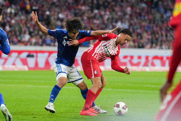 1. Bundesliga: SC Freiburg vs FC Schalke 04, 11.10.2026 Zweikampf zwischen Satoshi Tanaka (FC Schalke 04, 13) und Derry Scherhant (SC Freiburg, 7) 1. Bundesliga: SC Freiburg vs FC Schalke 04, Europa-Park-Stadion, 11.10.2026 DFB DFL REGULATIONS PROHIBIT ANY USE OF PHOTOGRAPHS AS IMAGE SEQUENCES AND OR QUASI-VIDEO. Copyright: xBEAUTIFULxSPORTS Boscox