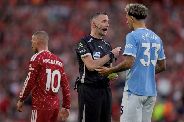 RECORD DATE NOT STATED Football - FA Premier League - Liverpool FC v Manchester City FC LIVERPOOL, ENGLAND - Sunday, October 11, 2026: Referee Chris Kavanagh shows Manchester City s Nico O Reilly (R) a yellow card during the FA Premier League match between Liverpool FC and Manchester City FC at Anfield. (Photo by David Rawcliffe Propaganda) LIVERPOOL Anfield MERSEYSIDE ENGLAND  Copyright: xDavidxRawcliffex 2026-10-11-Liverpool_v_Man_City-075