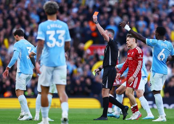 Referee Chris Kavanagh shows Ryan Gravenberch of Liverpool a red card Liverpool v Manchester City, Premier League, Football, Anfield, Liverpool, UK - 11 Oct 2026Liverpool Anfield United Kingdom EDITORIAL USE ONLY No use with unauthorised audio, video, data, fixture lists, club league logos or live services. Online in-match use limited to 120 images, no video emulation. No use in betting, games or single club league player publications. Copyright: xMattxWest Shutterstockx 17210728aa