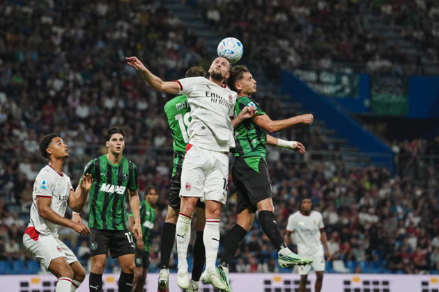 Milan s Adrien Rabiot fights for the ball with Sassuolo™s Nemanja Matic and Sassuolo™s Sebastiano Esposito during the Serie A soccer match between Sassuolo and Milan at the Mapei Stadium in Reggio Emilia, north Italy - Sunday, October 11, 2026 -  Copyright: xMassimoxPaolone LaPressex