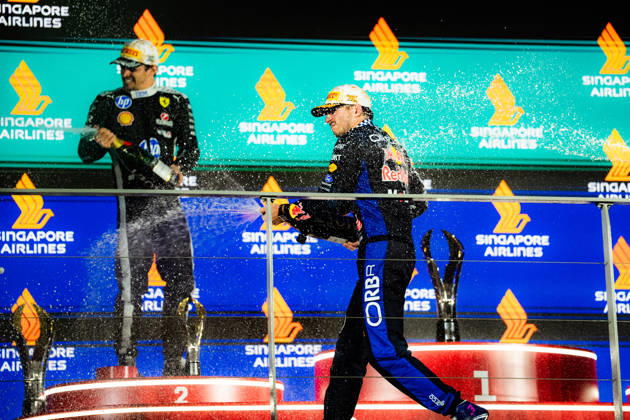 2026 Formula 1 Singapore Grand Prix - Podium CHARLES LECLERC 16 (MON) of Scuderia Ferrari HP (Ferrari SF-26) and MAX VERSTAPPEN 1 (NED) of Oracle Red Bull Racing (Red Bull Racing RB22) champagne celebration on the podium on Sunday Race Day during the Formula 1 Singapore Airlines Singapore Grand Prix 2026 at Marina Bay Street Circuit, Singapore, on October 11, 2026. Photo by Antoine Lapeyre Reveries Agency via ABACAPRESS.COM Singapore Singapore Copyright: xAntoinexLapeyre ReveriesxAgency ABACAx