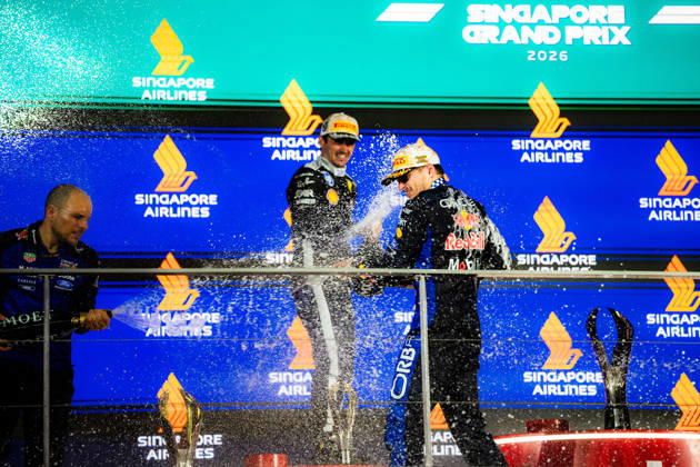 2026 Formula 1 Singapore Grand Prix - Podium CHARLES LECLERC 16 (MON) of Scuderia Ferrari HP (Ferrari SF-26) and MAX VERSTAPPEN 1 (NED) of Oracle Red Bull Racing (Red Bull Racing RB22) champagne celebration on the podium on Sunday Race Day during the Formula 1 Singapore Airlines Singapore Grand Prix 2026 at Marina Bay Street Circuit, Singapore, on October 11, 2026. Photo by Antoine Lapeyre Reveries Agency via ABACAPRESS.COM Singapore Singapore Copyright: xAntoinexLapeyre ReveriesxAgency ABACAx