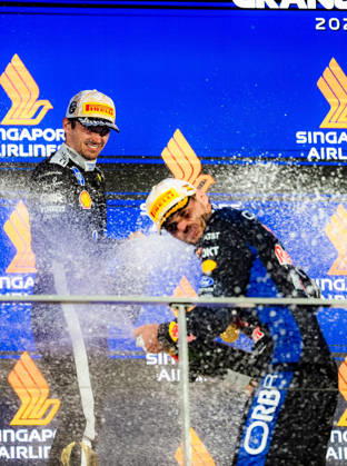 2026 Formula 1 Singapore Grand Prix - Podium CHARLES LECLERC 16 (MON) of Scuderia Ferrari HP (Ferrari SF-26) and MAX VERSTAPPEN 1 (NED) of Oracle Red Bull Racing (Red Bull Racing RB22) champagne celebration on the podium on Sunday Race Day during the Formula 1 Singapore Airlines Singapore Grand Prix 2026 at Marina Bay Street Circuit, Singapore, on October 11, 2026. Photo by Antoine Lapeyre Reveries Agency via ABACAPRESS.COM Singapore Singapore Copyright: xAntoinexLapeyre ReveriesxAgency ABACAx