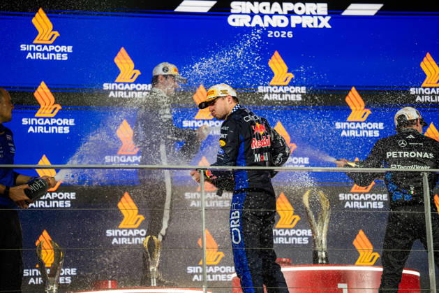 2026 Formula 1 Singapore Grand Prix - Podium CHARLES LECLERC 16 (MON) of Scuderia Ferrari HP (Ferrari SF-26) and MAX VERSTAPPEN 1 (NED) of Oracle Red Bull Racing (Red Bull Racing RB22) champagne celebration on the podium on Sunday Race Day during the Formula 1 Singapore Airlines Singapore Grand Prix 2026 at Marina Bay Street Circuit, Singapore, on October 11, 2026. Photo by Antoine Lapeyre Reveries Agency via ABACAPRESS.COM Singapore Singapore Copyright: xAntoinexLapeyre ReveriesxAgency ABACAx
