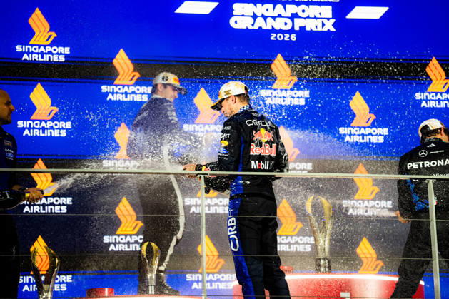 2026 Formula 1 Singapore Grand Prix - Podium CHARLES LECLERC 16 (MON) of Scuderia Ferrari HP (Ferrari SF-26) and MAX VERSTAPPEN 1 (NED) of Oracle Red Bull Racing (Red Bull Racing RB22) champagne celebration on the podium on Sunday Race Day during the Formula 1 Singapore Airlines Singapore Grand Prix 2026 at Marina Bay Street Circuit, Singapore, on October 11, 2026. Photo by Antoine Lapeyre Reveries Agency via ABACAPRESS.COM Singapore Singapore Copyright: xAntoinexLapeyre ReveriesxAgency ABACAx