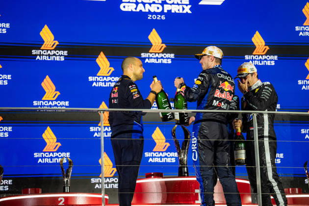2026 Formula 1 Singapore Grand Prix - Podium MAX VERSTAPPEN 1 (NED) of Oracle Red Bull Racing (Red Bull Racing RB22) GIANPIERO LAMBIASE (ITA) Race Engineer for Oracle Red Bull Racing (Red Bull Racing RB22) CHARLES LECLERC 16 (MON) of Scuderia Ferrari HP (Ferrari SF-26) and ANDREA KIMI ANTONELLI 12 (ITA) of Mercedes-AMG PETRONAS Formula One Team (Mercedes-AMG F1 W17) celebrating on the podium on Sunday Race Day during the Formula 1 Singapore Airlines Singapore Grand Prix 2026 at Marina Bay Street Circuit, Singapore, on October 11, 2026. Photo by Antoine Lapeyre Reveries Agency via ABACAPRESS.COM Singapore Singapore Copyright: xAntoinexLapeyre ReveriesxAgency ABACAx