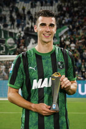 Sassuolo™s Cas Odenthal Panini Player of the match at the end of the Serie A soccer match between Sassuolo and Milan at the Mapei Stadium in Reggio Emilia, north Italy - Sunday, October 11, 2026 - Copyright: xMassimoxPaolone LaPressex