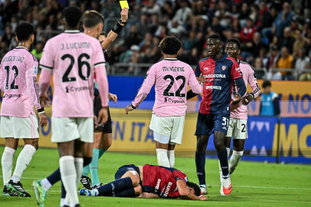 IPA89566244 - Alessandro Romano of Cagliari Calcio, Weston McKennie of Juventus FC, Yellow Card during the Cagliari Calcio vs. Juventus FC Italian Serie A soccer match in Cagliari, Italy, October 11, 2026  Copyright: xLuigixCanu IPAxSportx xx IPA89566244