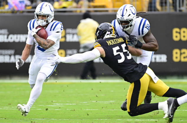 Indianapolis Colts wide receiver Anthony Gould (6) evades the grasp of Pittsburgh Steelers linebacker Cole Holcomb (55) during the first quarter at Acrisure Stadium on Sunday, October 11, 2026 in Pittsburgh.  PIT2026101108 ARCHIExCARPENTER