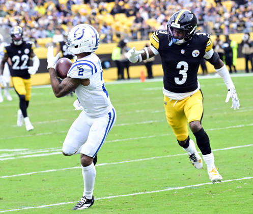 Indianapolis Colts wide receiver Josh Downs (2) pulls in a 42 yard pass with Pittsburgh Steelers safety Jaquan Brisker (3) in coverage during the second quarter at Acrisure Stadium on Sunday, October 11, 2026 in Pittsburgh. PIT2026101111 ARCHIExCARPENTER