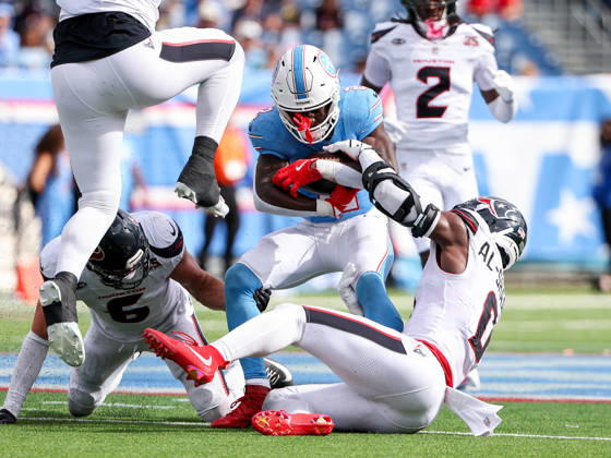 Oct 11, 2026; Nashville, TN, USA; Tennessee Titans running back Tyjae Spears (2) is tackled by Houston Texans linebacker Azeez al-Shaair (0) during the NFL, American Football Herren, USA regular season game between the Houston Texans and Tennessee Titans at Nissan Stadium. Mandatory Credit: -Cal Media NFL 2026: Texans Vs Titans OCT 11  - ZUMAc04_ 20261011_zma_c04_076 Copyright: xStephenxFurstx