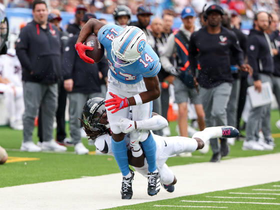 Oct 11, 2026; Nashville, TN, USA; Houston Texans safety Calen Bullock (2) tackles Tennessee Titans wide receiver Carnell Tate (14) out of bounds during the NFL, American Football Herren, USA regular season game between the Houston Texans and Tennessee Titans at Nissan Stadium. Mandatory Credit: -Cal Media Nashville USA - ZUMAc04_ 20261011_zma_c04_069 Copyright: xStephenxFurstx