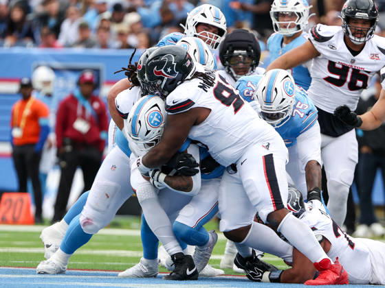 Oct 11, 2026; Nashville, TN, USA; Tennessee Titans running back Tony Pollard (20) is tackled for a loss of yards during the NFL, American Football Herren, USA regular season game between the Houston Texans and Tennessee Titans at Nissan Stadium. Mandatory Credit: -Cal Media Nashville USA - ZUMAc04_ 20261011_zma_c04_072 Copyright: xStephenxFurstx