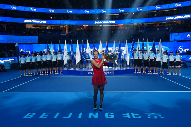 (261011) -- BEIJING, Oct. 11, 2026 -- Zheng Qinwen poses with the trophy during the awarding ceremony after the women s singles final between Zheng Qinwen of China and Mirra Andreeva of Russia at 2026 China Open tennis tournament in Beijing, China, Oct. 11, 2026. ) (SP)CHINA-BEIJING-TENNIS-CHINA OPEN-WOMEN S SINGLES-FINAL (CN) SunxFei