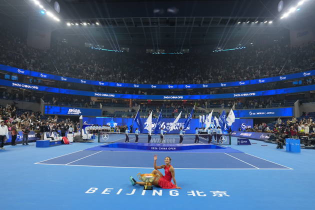 (261011) -- BEIJING, Oct. 11, 2026 -- Zheng Qinwen poses with the trophy during the awarding ceremony after the women s singles final between Zheng Qinwen of China and Mirra Andreeva of Russia at 2026 China Open tennis tournament in Beijing, China, Oct. 11, 2026. ) (SP)CHINA-BEIJING-TENNIS-CHINA OPEN-WOMEN S SINGLES-FINAL (CN) SunxFei