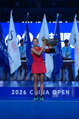 (261011) -- BEIJING, Oct. 11, 2026 -- Zheng Qinwen poses with the trophy during the awarding ceremony after the women s singles final between Zheng Qinwen of China and Mirra Andreeva of Russia at 2026 China Open tennis tournament in Beijing, China, Oct. 11, 2026. ) (SP)CHINA-BEIJING-TENNIS-CHINA OPEN-WOMEN S SINGLES-FINAL (CN) SunxFei