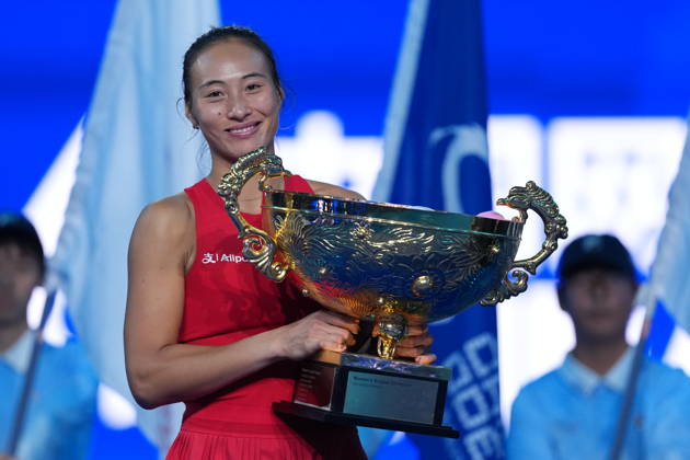 (261011) -- BEIJING, Oct. 11, 2026 -- Zheng Qinwen poses with the trophy during the awarding ceremony after the women s singles final between Zheng Qinwen of China and Mirra Andreeva of Russia at 2026 China Open tennis tournament in Beijing, China, Oct. 11, 2026. ) (SP)CHINA-BEIJING-TENNIS-CHINA OPEN-WOMEN S SINGLES-FINAL (CN) SunxFei