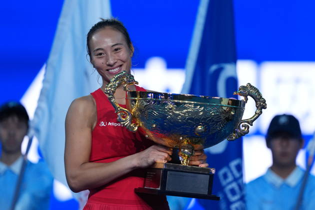 (261011) -- BEIJING, Oct. 11, 2026 -- Zheng Qinwen poses with the trophy during the awarding ceremony after the women s singles final between Zheng Qinwen of China and Mirra Andreeva of Russia at 2026 China Open tennis tournament in Beijing, China, Oct. 11, 2026. ) (SP)CHINA-BEIJING-TENNIS-CHINA OPEN-WOMEN S SINGLES-FINAL (CN) SunxFei
