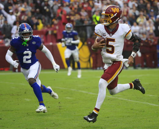 October 11, 2026: Washington Commanders QB 5 Jayden Daniels runs for a touchdown during the Washington Commanders game against the New York Giants at Northwest Stadium in Landover, MD. CSM NFL, American Football Herren, USA 2026: Washington Commanders Vs New York Giants OCT 11 - ZUMAc04_ 20261011_zma_c04_096 Copyright: xJustinxCooperx